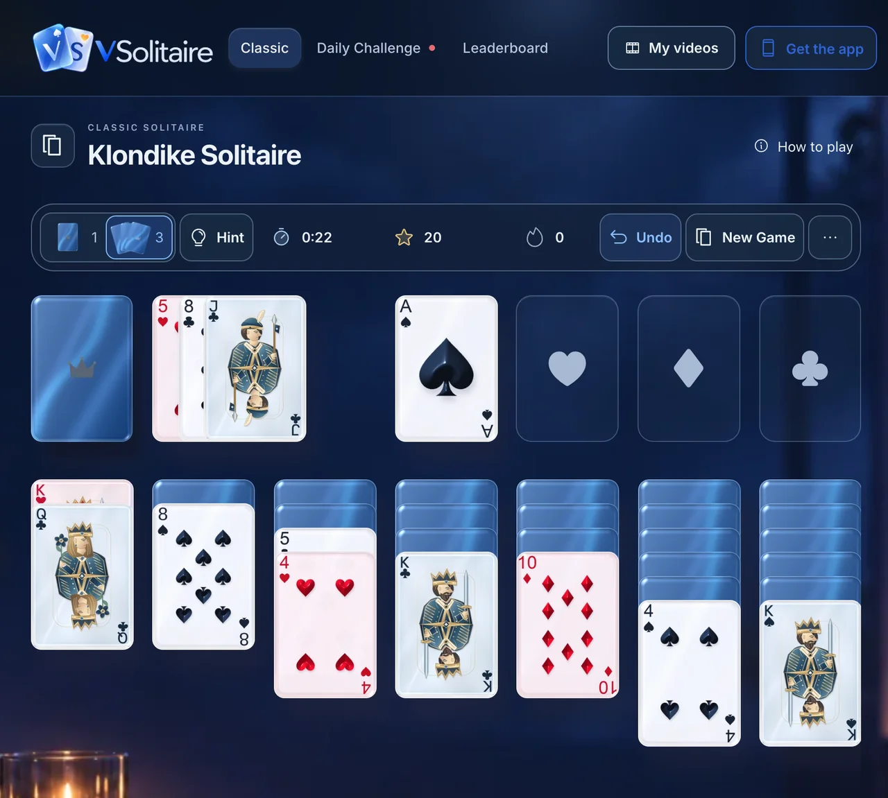 The same Klondike game on desktop in the dark theme.