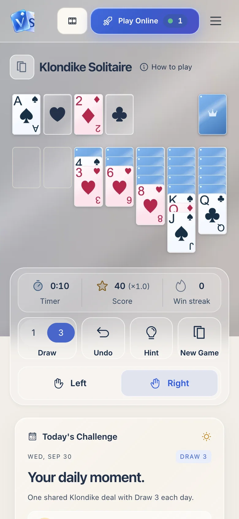 A Klondike game in a phone browser, with Draw, Undo, Hint and New Game under the cards and a left or right hand choice.